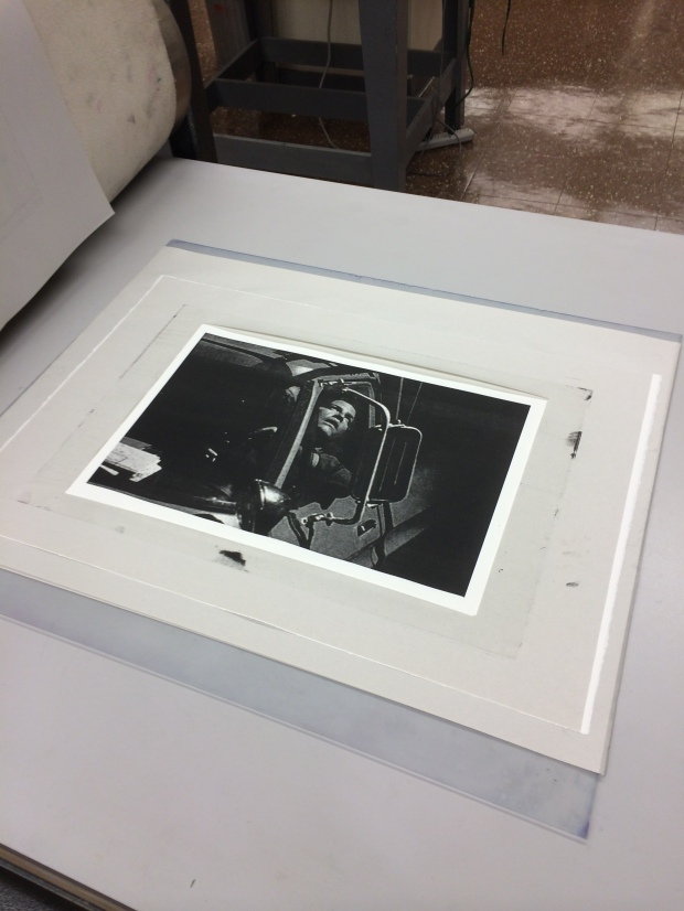 Printed image with frame protecting the paper.